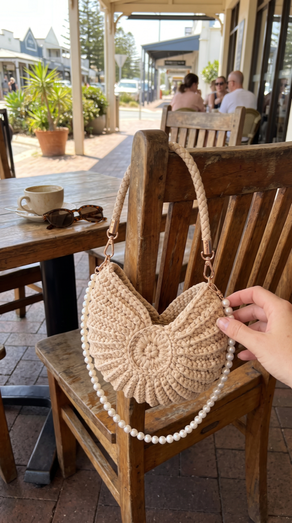Shell handbag on a cafe chair, Port Fairy