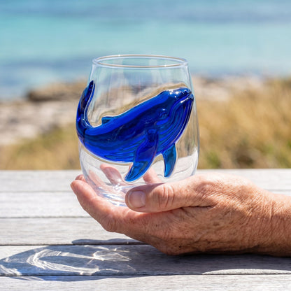 An ocean glass held in hand to show scale