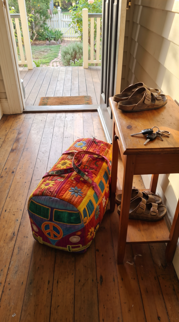 Kombi weekender packed by the front door