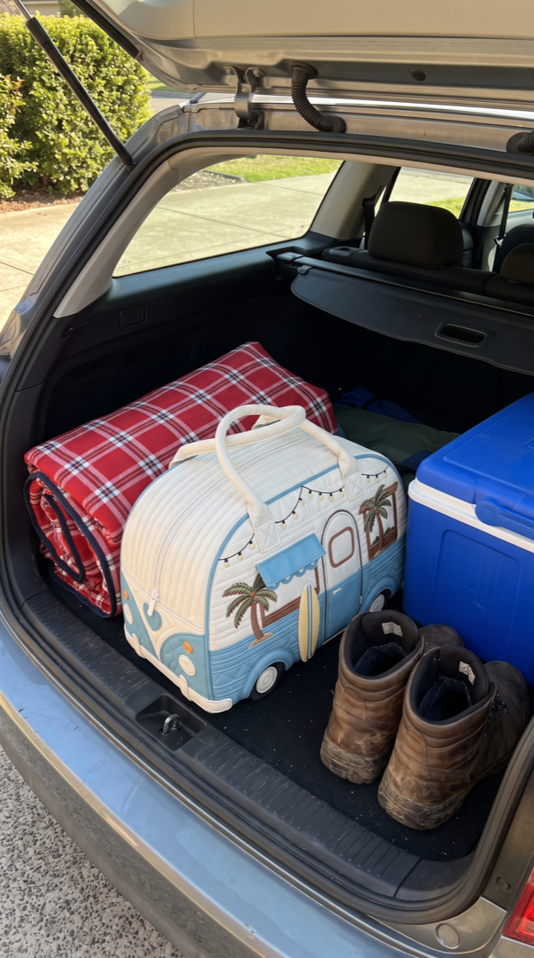 Kombi weekender packed flat in a station wagon boot