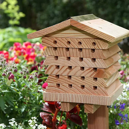 Blossom Guardian bee hotel mounted in a garden
