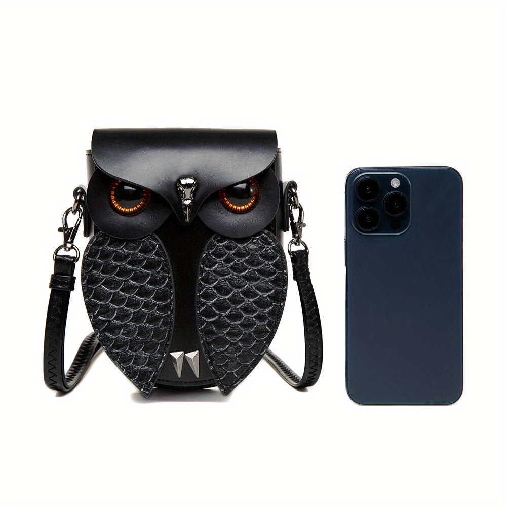 Owl bag size comparison next to a smartphone