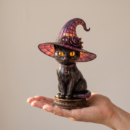 The lamp held on an open hand to show its true size, about six inches tall