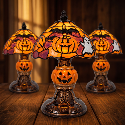 Three of the lamps lit together on a wooden table