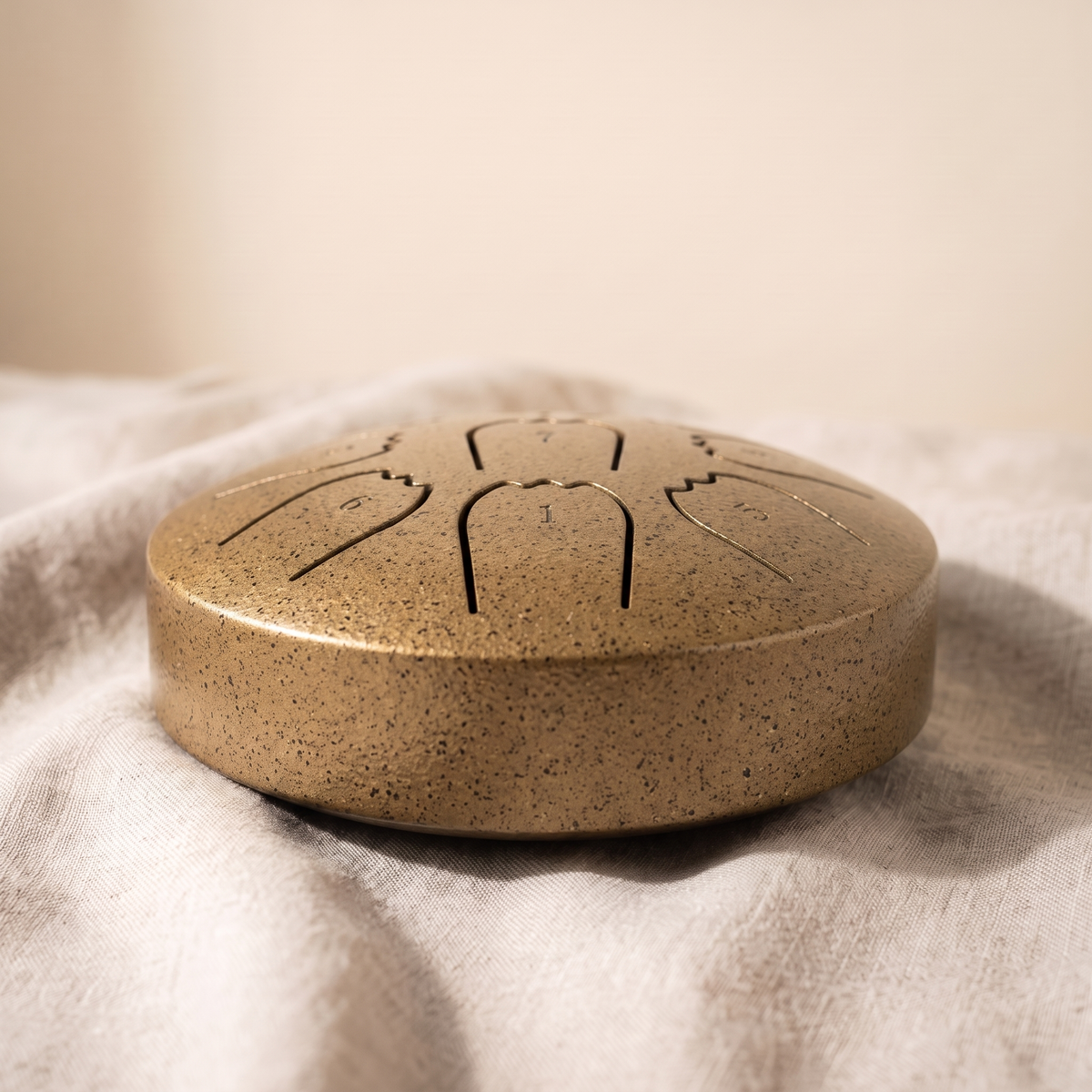 Hand-tuned rain drum in antique golden bronze