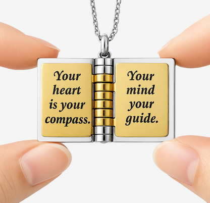 The Champion locket opened to the page reading Your heart is your compass