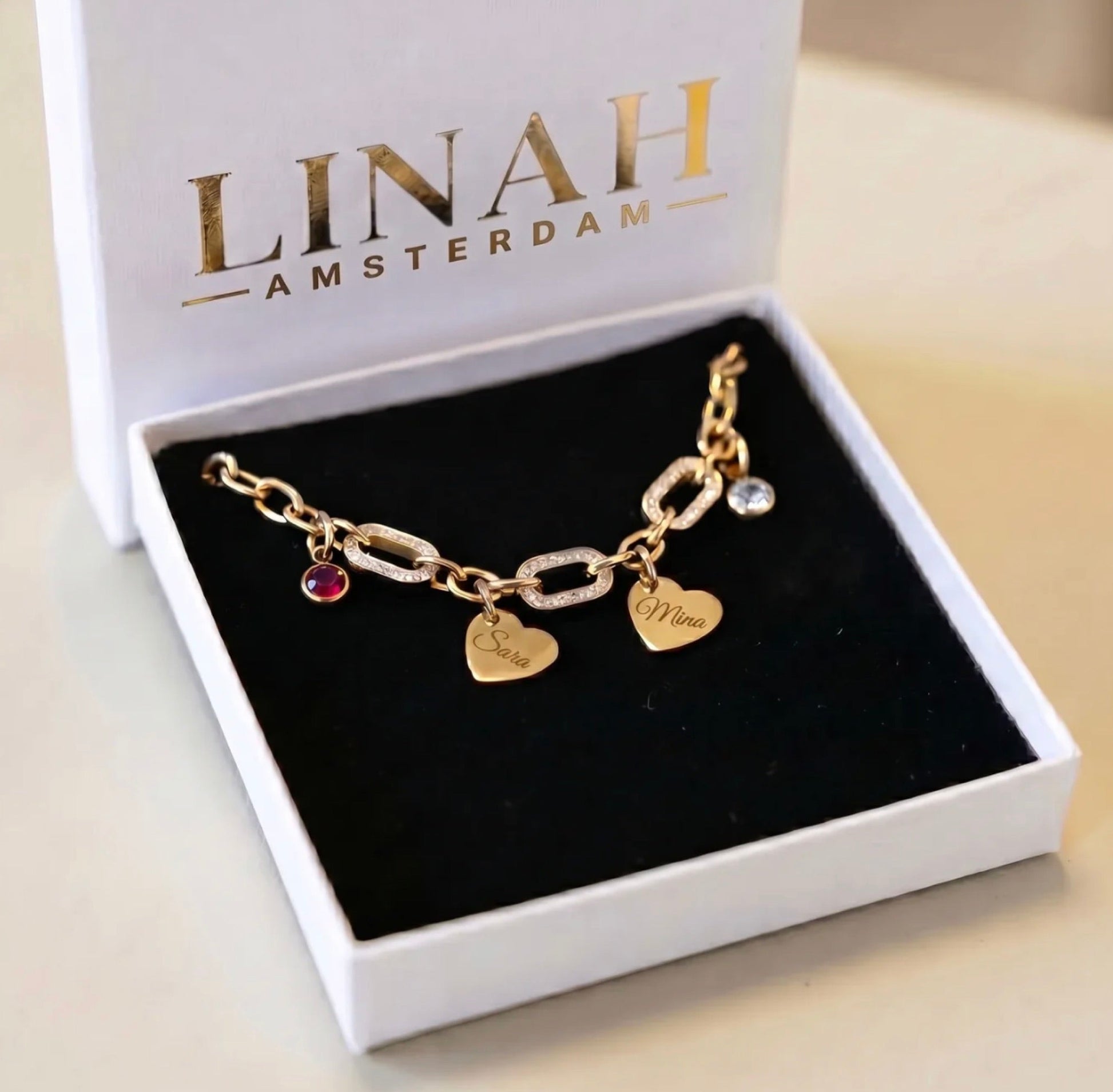 The Amara heart bracelet worn on a wrist