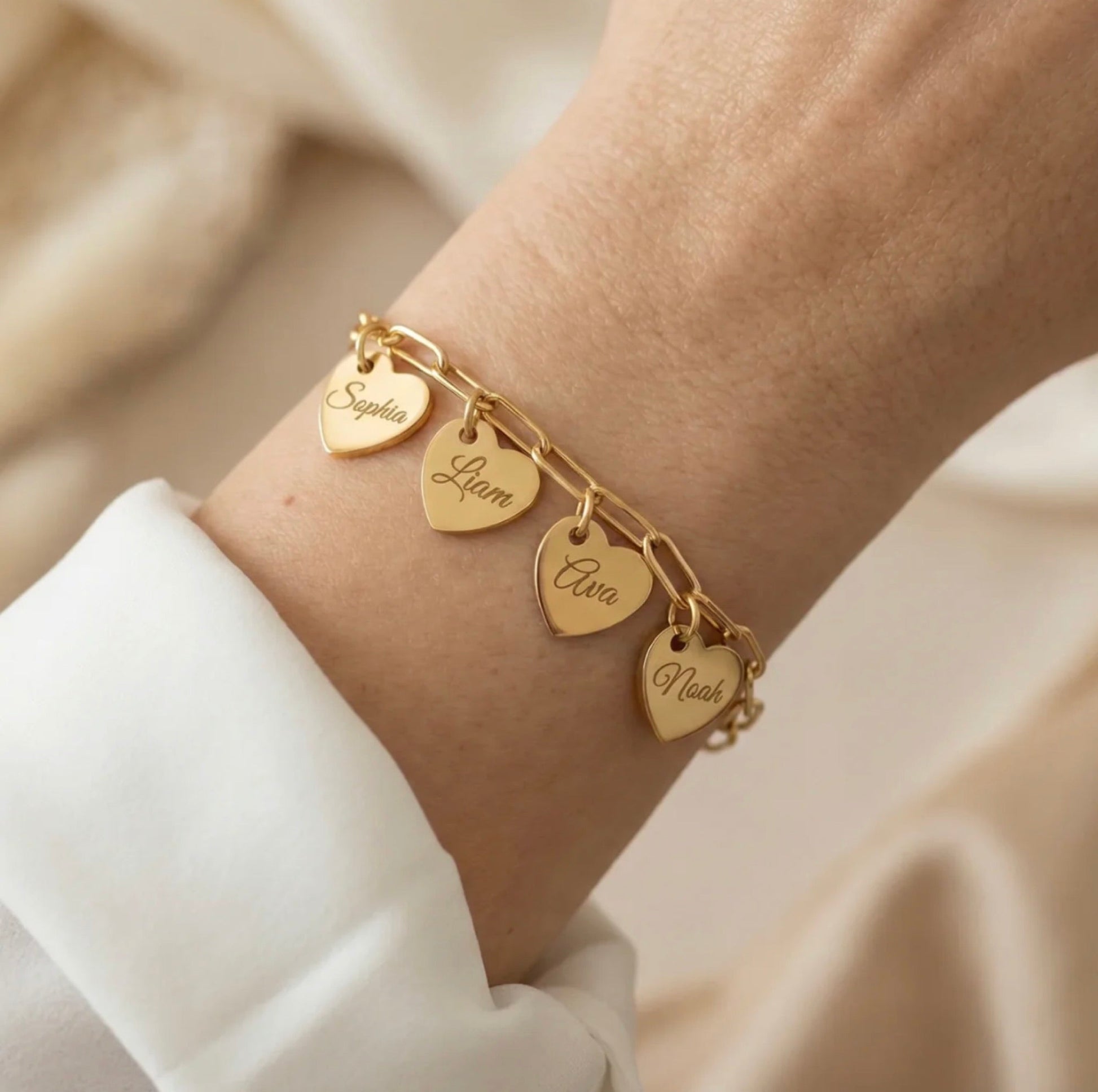 The Florence family charm bracelet on a wrist