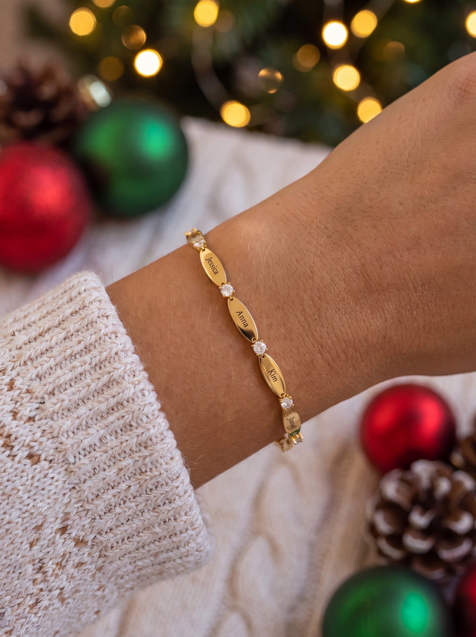 The Luna name bracelet — engraved oval tags with crystals