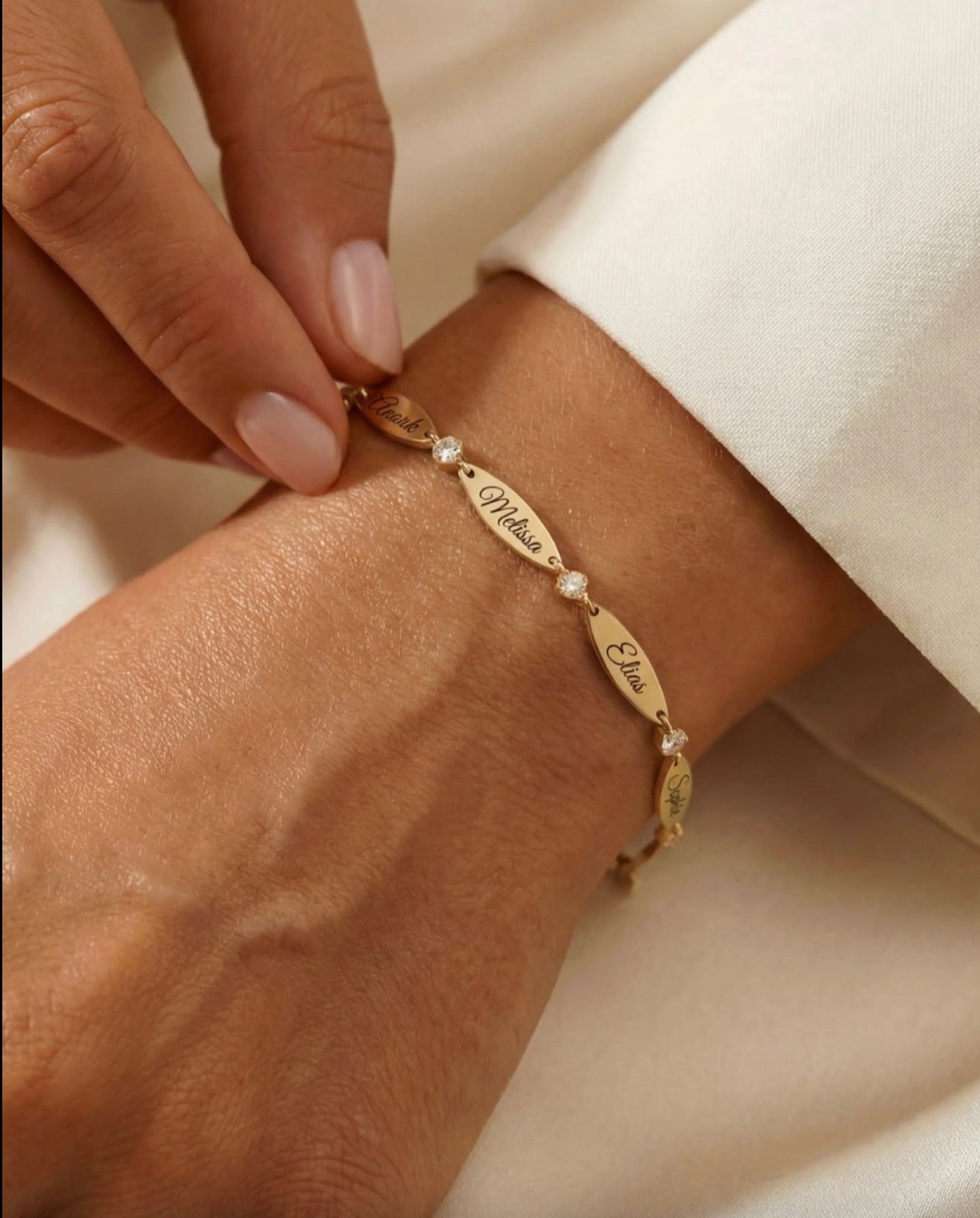 The Luna name bracelet — on model