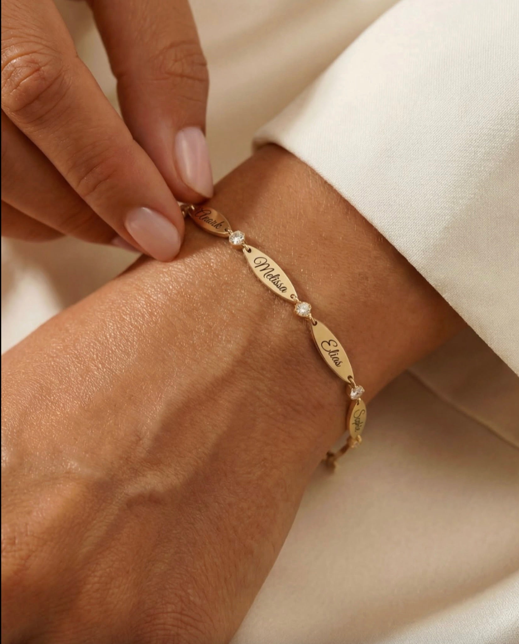 The Luna name bracelet — on model